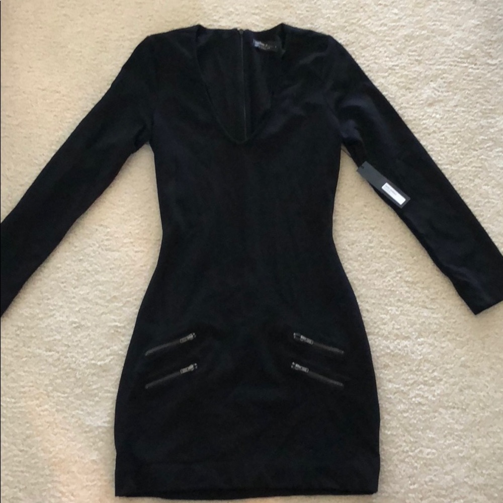 Sleek black mini long sleeve dress